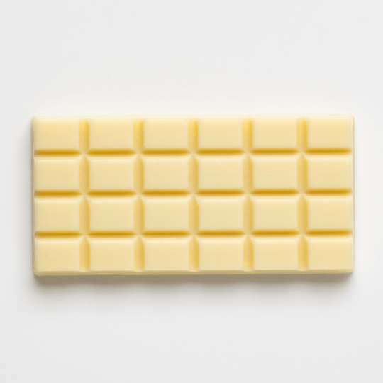 Close-up of Callebaut white chocolate bar grid texture