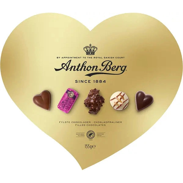 Open Anthon Berg gold heart chocolate box showing assorted pralines and logo