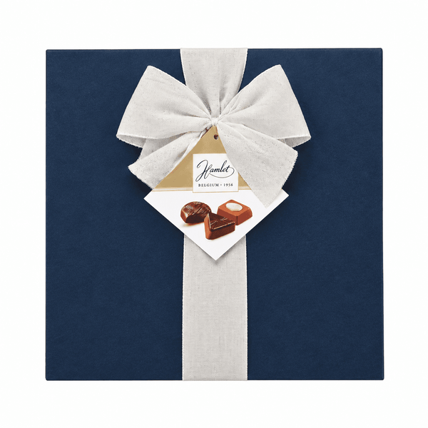 Mr Burton blue praline box with linen ribbon and gold tag
