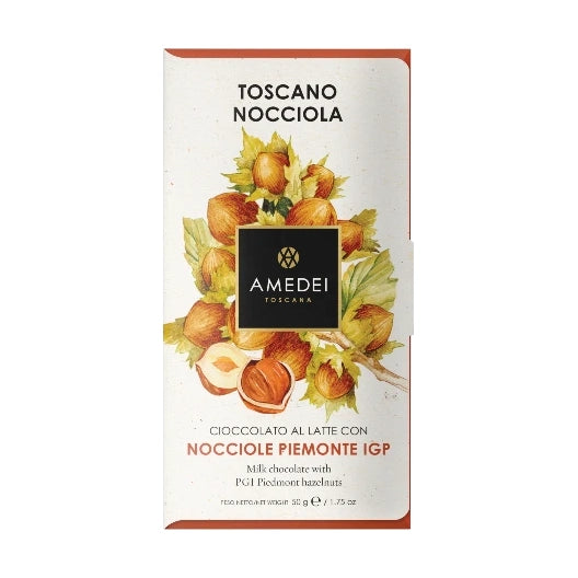 Chokladshopen Amedei Toscano Nocciola mjölkchokladkaka med hela rostade hasselnötter i elegant förpackning