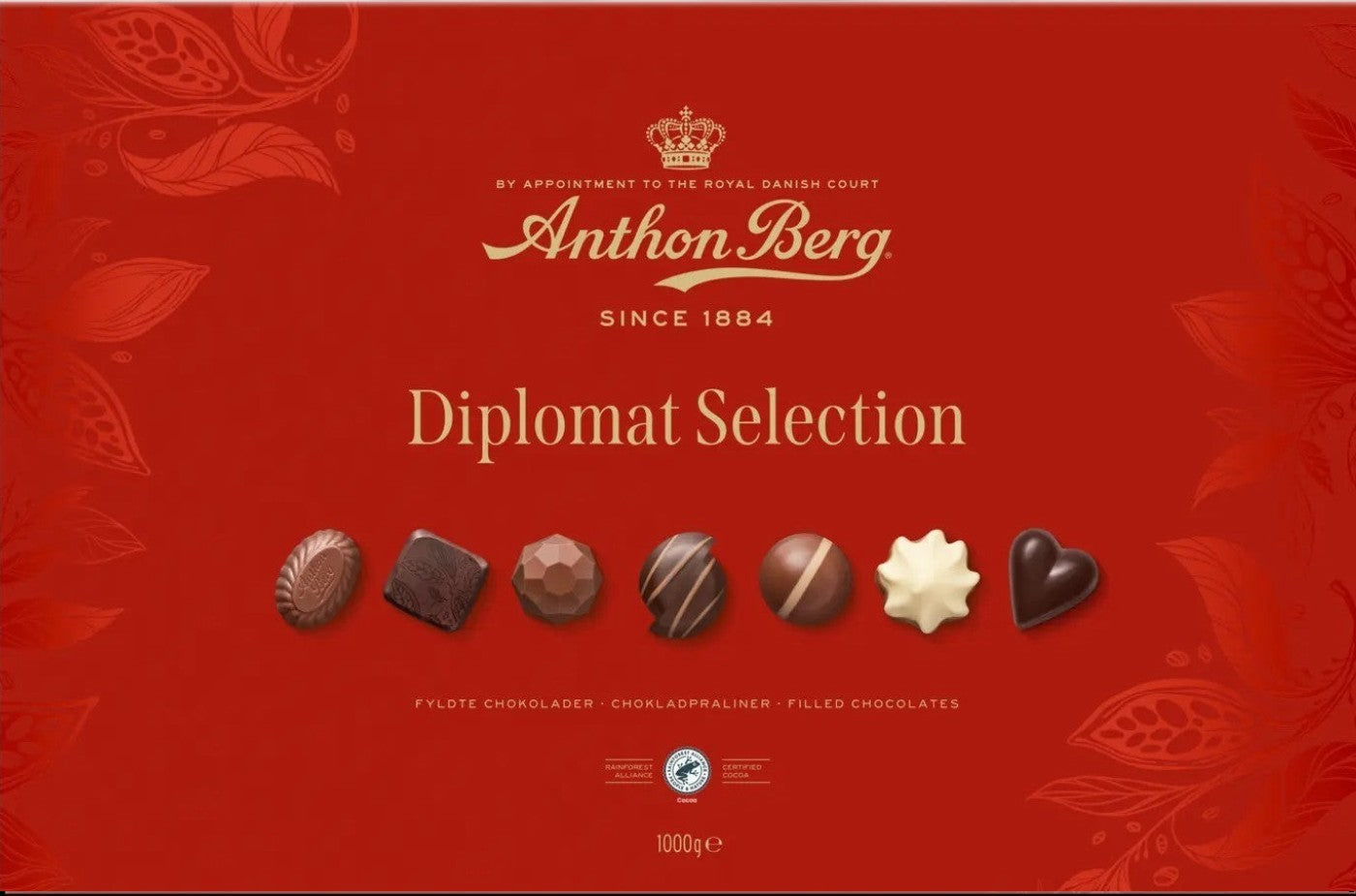 Chokladshopen Anthon Berg Diplomat chokladask med 1000g lyxiga praliner i en elegant röd presentförpackning.