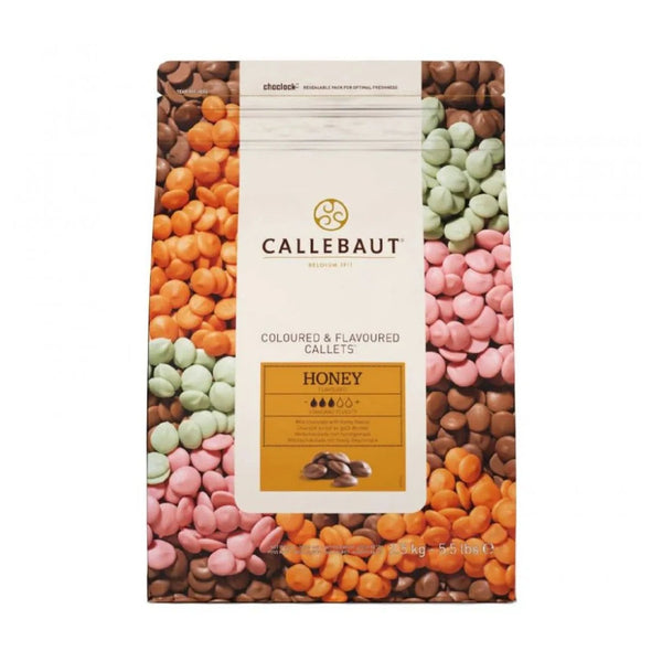 Chokladshopen Callebaut Honey mjölkchoklad i 2,5 kg förpackning med färgade och smaksatta chokladpellets.
