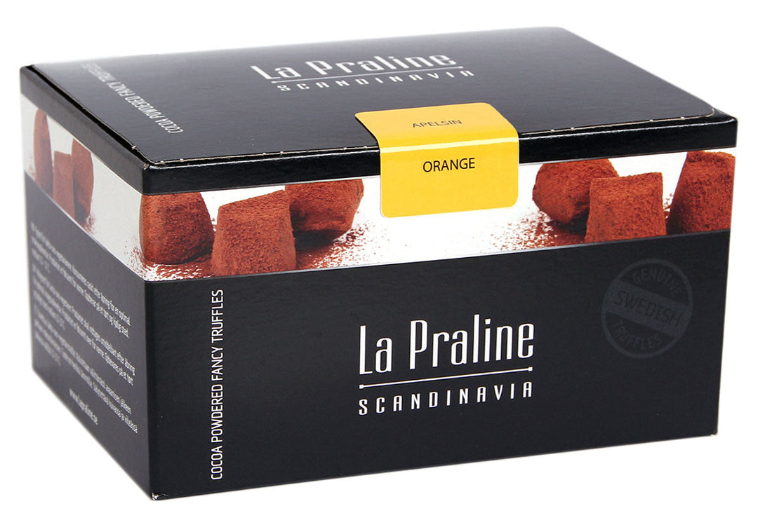 Chokladshopen La Praline tryfflar med apelsinsmak i svart presentask pudrade med kakao