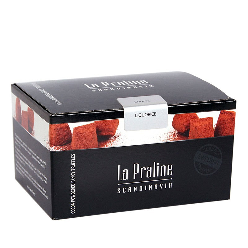 Chokladshopen La Praline tryfflar med lakritssmak i en elegant svart presentask med kakaopudrade tryfflar