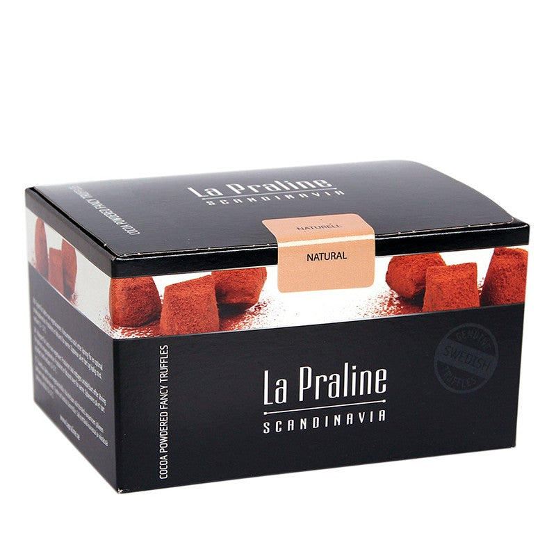 Chokladshopen La Praline Naturella tryfflar i en elegant svart presentask med kakaopudrade chokladbitar