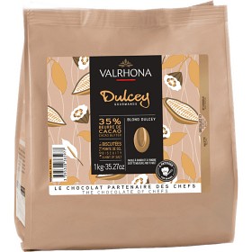 Chokladshopen Valrhona Dulcey blond choklad 35% i 1 kg förpackning med smak av kola och smörkex.