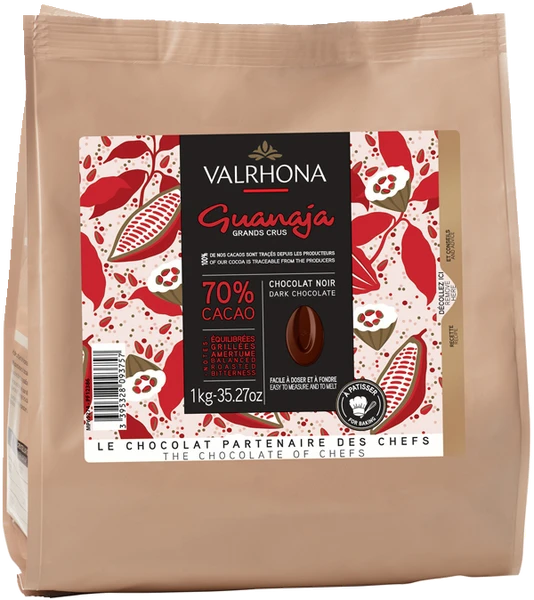 Chokladshopen Valrhona Guanaja 70% mörk bakchoklad i en 1 kg påse med elegant rött kakaomönster.