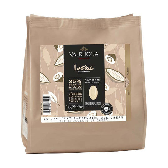 Chokladshopen Valrhona Ivoire 35% vit choklad i 1 kg påse med vaniljtoner för bakning och desserter