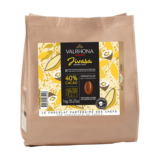 Chokladshopen Valrhona Jivara 40% mjölkchoklad i en 1 kg påse med gul och brun etikett för bakning och desserter