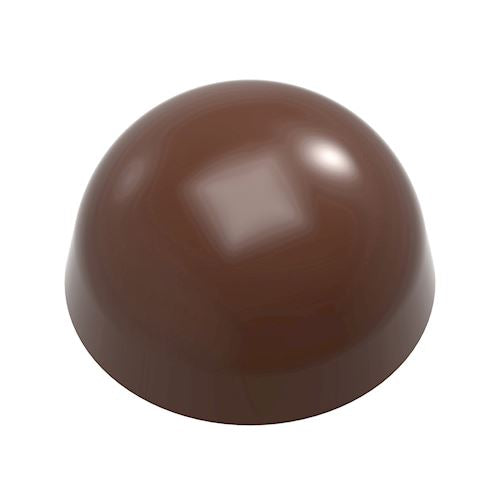Glansig kupolformad mörk chokladpralin med slät yta